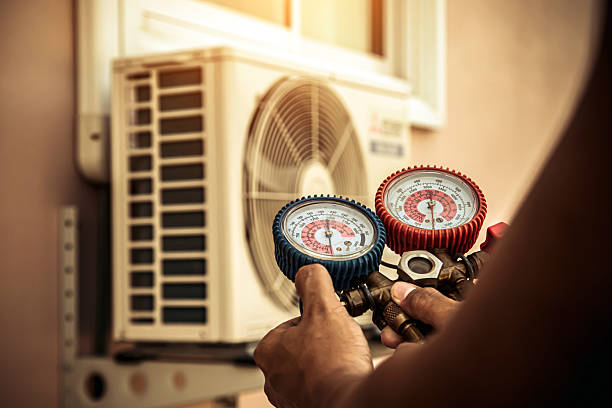 Professional Air Conditioning Service technician working in Coloma, CA